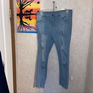 light blue ripped jeans